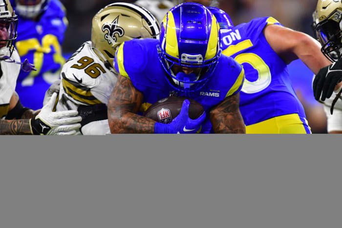 Dec 21, 2023; Inglewood, California, USA; Los Angeles Rams running back Kyren Williams (23) runs the ball against New Orleans Saints defensive end Carl Granderson (96) during the first half at SoFi Stadium.